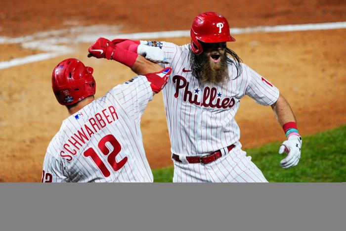 Phillies center fielder Brandon Marsh celebrates with Kyle Schwarber after hitting a home run in Game 3 of the World Series.